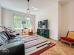 Wohnzimmer - Hochwertig 3-Zimmerwohnung mit EBK, Balkon und Ausblick ins Grüne.