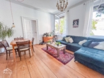 Wohnzimmer - Sonnige 3-Zimmer-Altbauwohnung in bester Lage in Stuttgart West