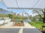 Terrasse - Luxuriöses Einfamilienhaus mit hochwertiger Ausstattung, traumhaftem Garten und Außenpool