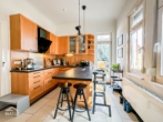 Küche - Luxuriöse 5-Zimmer Altbauwohnung mit Einbauküche, zwei Balkonen und Garage!