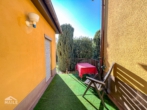 Terrasse zwischen den Häusern - Vielfältig nutzbares EFH mit Anbau, auch als Mehrgenerationenhaus nutzbar oder teilbar!