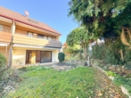 Gartenansicht - Großes Reihenendhaus mit Garten und Garage in gefragter Lage.
