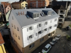 Hausansicht - Moderne und gepflegte 3,5 Zimmerwohnung mit EBK, Stellplatz und Balkon
