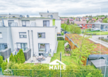 Außenansicht - Großzügiges Reihenendhaus mit Garten, Dachterrasse und Wärmepumpe