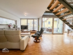 Wohnzimmer - Neuwertige Luxuswohnung mit Terrasse und Einbauküche