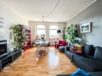 Wohnzimmer - Großzügiger Altbau mit Balkon am Marienplatz!