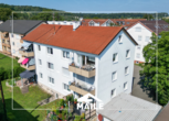 Hausansicht Garten - Gepflegtes Mehrfamilienhaus in Riederich – Optimale Kapitalanlage mit guter Rendite