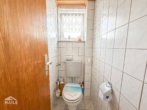 Gäste-WC EG rechts - Gepflegtes Mehrfamilienhaus in Riederich – Optimale Kapitalanlage mit guter Rendite